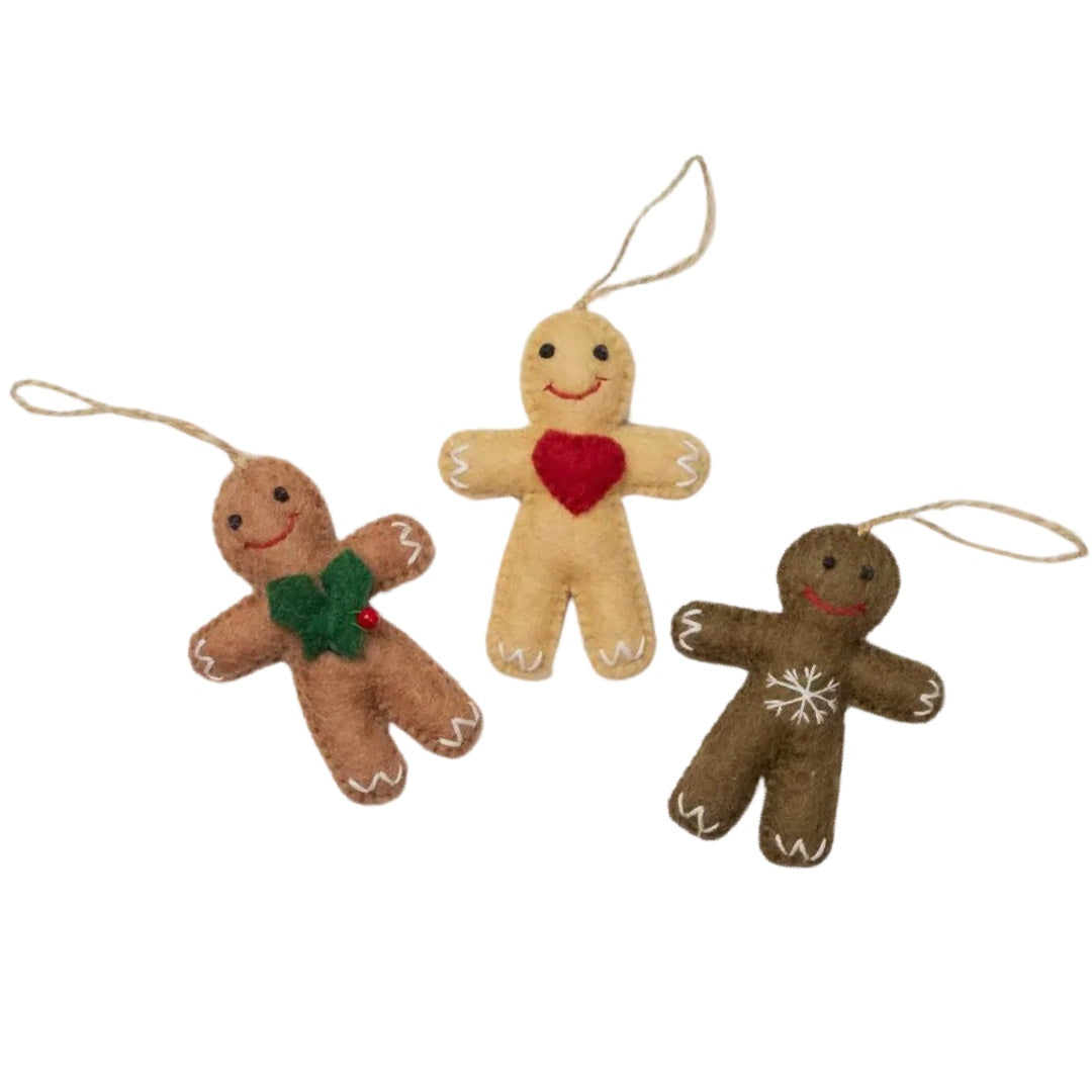 Trio of felt gingerbread ornaments with various designs