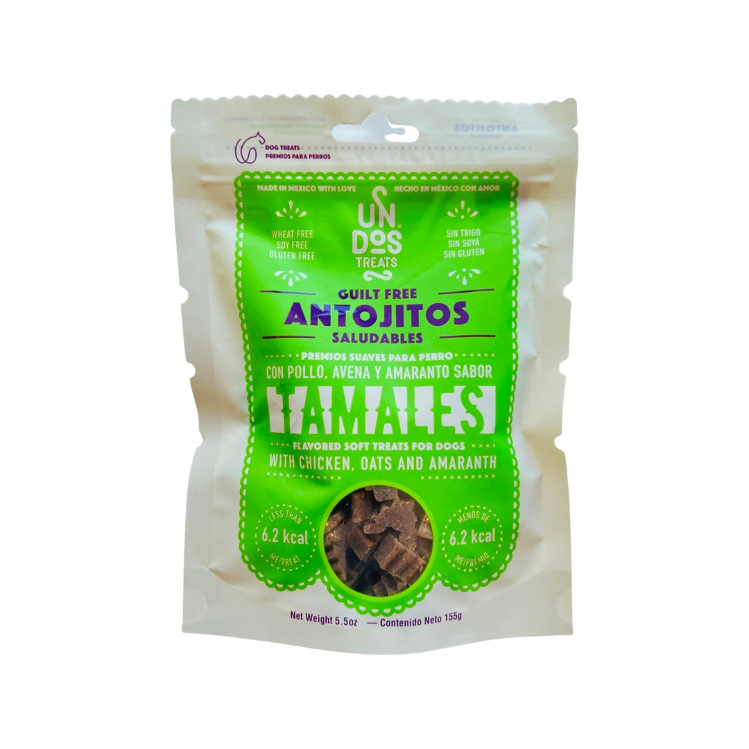 5.5 oz of dog treats in a white and green branded bag