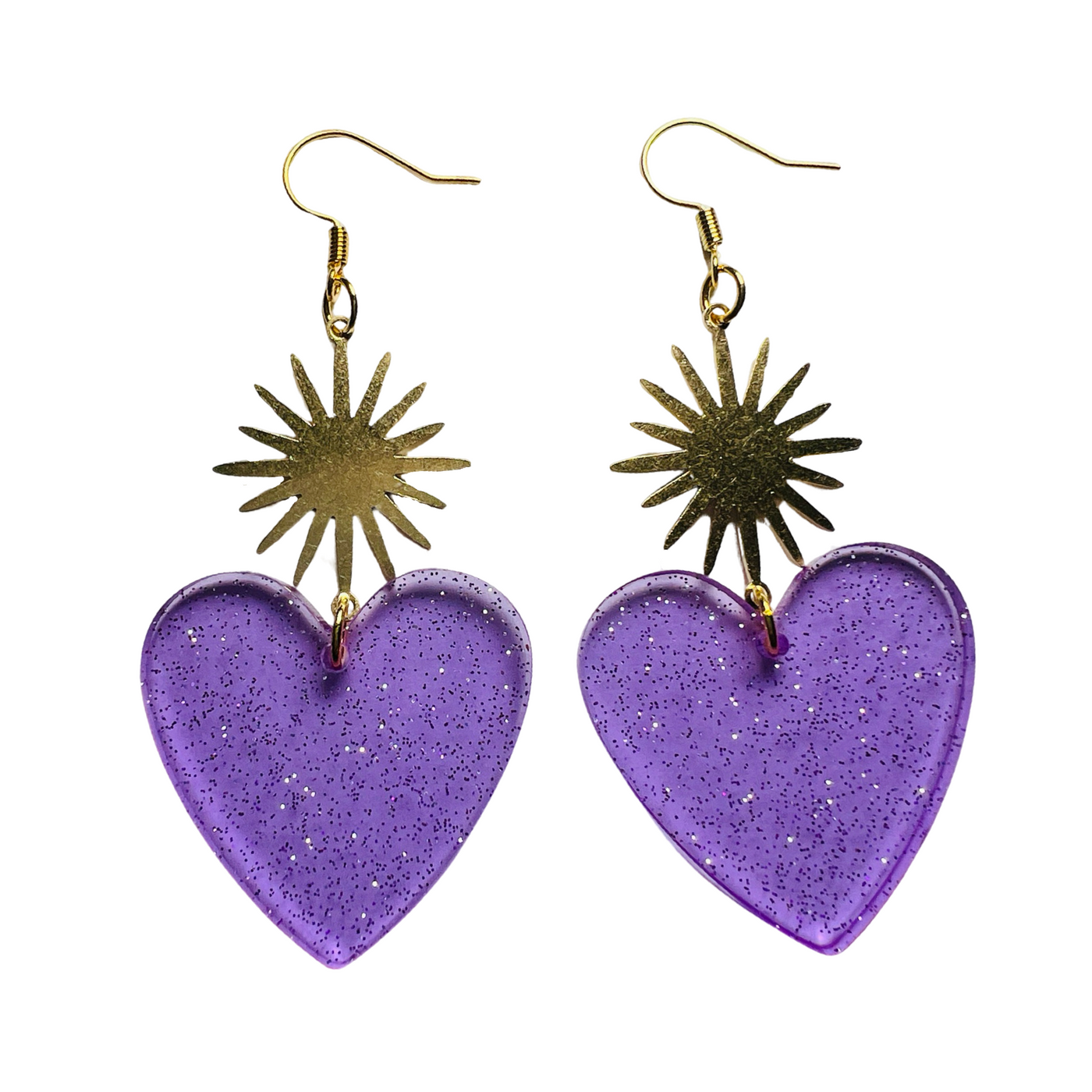 set of purple glitter resin heart earrings with a brass sunburst