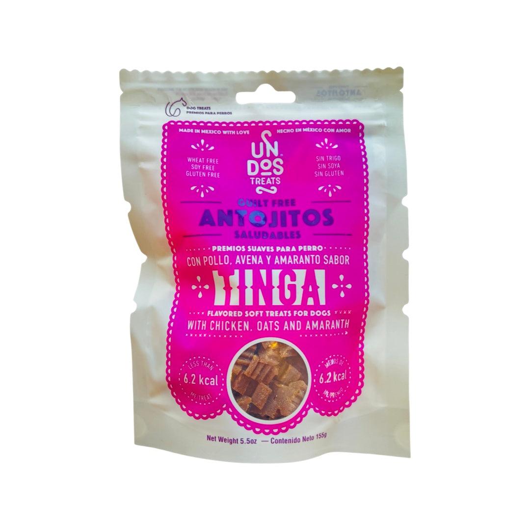 5.5 oz of dog treats in a white and fuschia branded bag