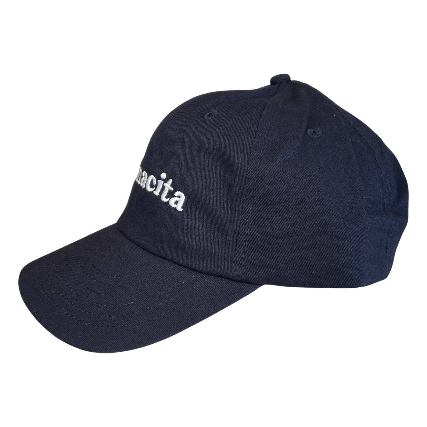 side view of a navy blue hat with the phrase Mamacita in white lettering
