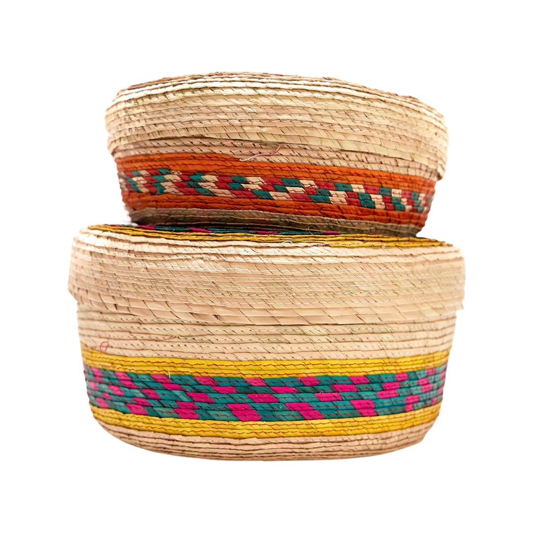Side view of small woven tortilla basket on top of large woven tortilla basket (to compare sizes).