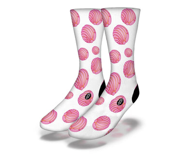 Junior mid calf pink concha socks with white and black accent colors.