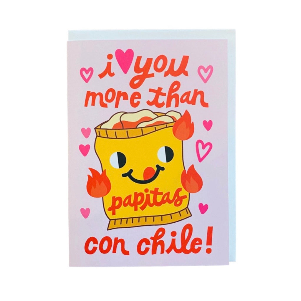 "I love you more than papitas con chile!" phrase greeting card. Design features smiling bag of chips with hearts and flames.