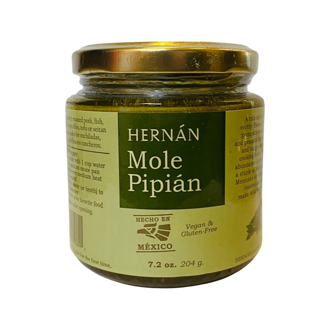 front view of Hernán Mole Pipian in branded glass jar with lid.