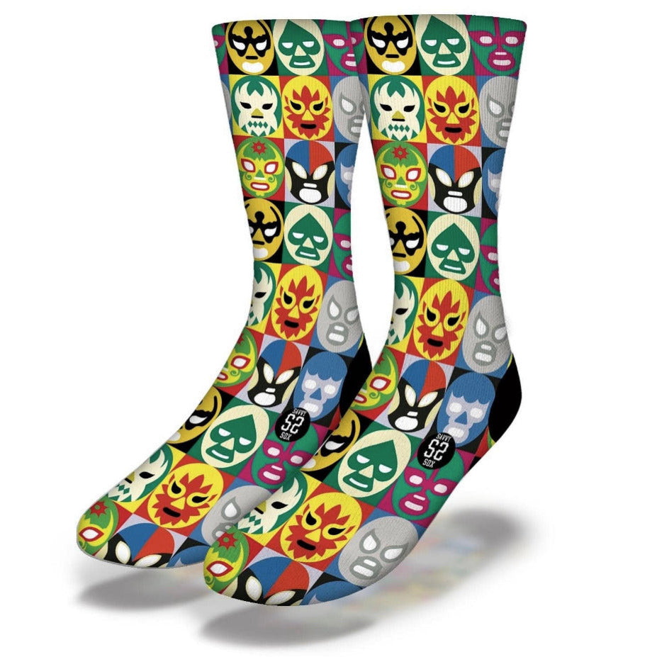 Junior mid calf socks with multi patterned lucha libre design.