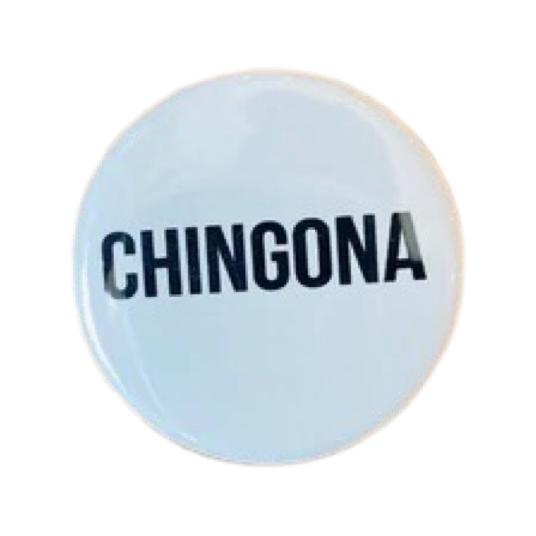 Round pin button with a white background and the phrase Chingona in black lettering