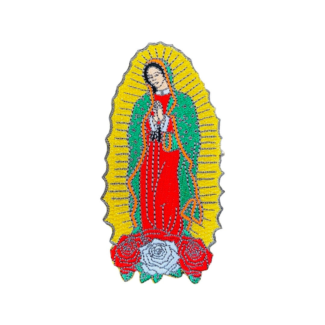 Virgen de Guadalupe image with gold rays and red and white roses. 