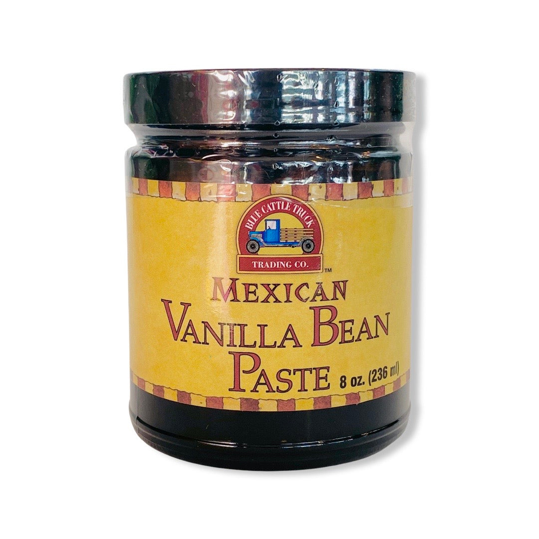 Mexican Vanilla Bean Paste in branded glass jar with lid.