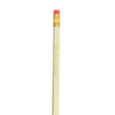 Cream colored Amigas For Life phrase pencil.