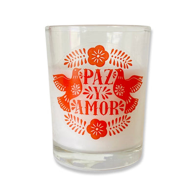 Small Paz y Amor votive candle with red doves and floral design.