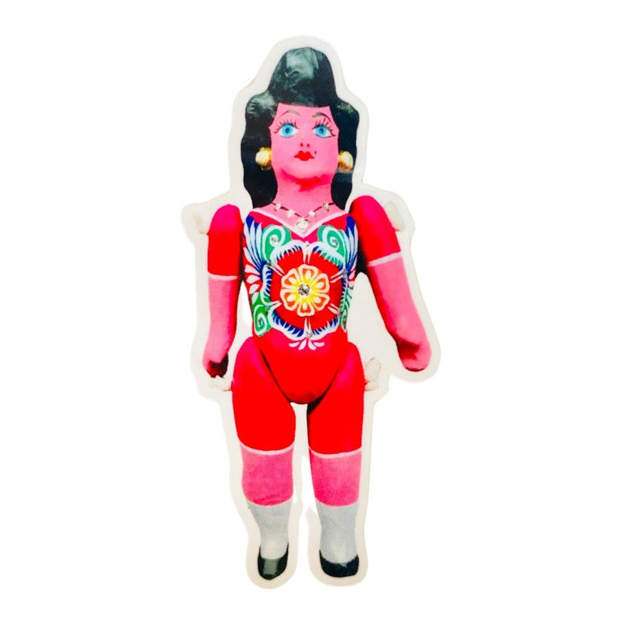 Maria doll sticker. Doll is wearing a red outfit with floral design.