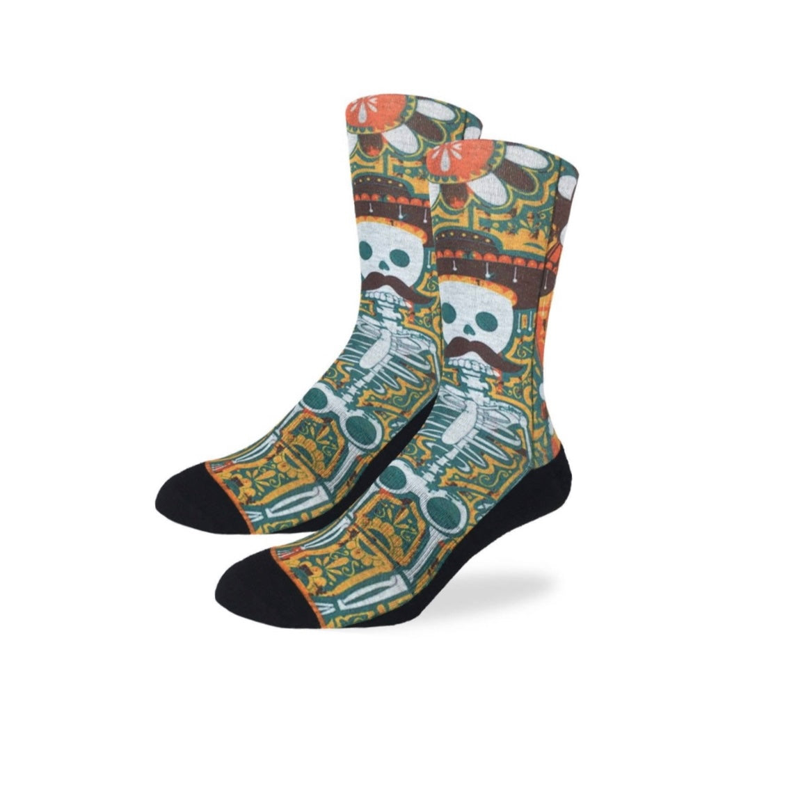Colorful men's midcalf Señor Bones socks. Design features skeleton with mustache and sombrero. 
