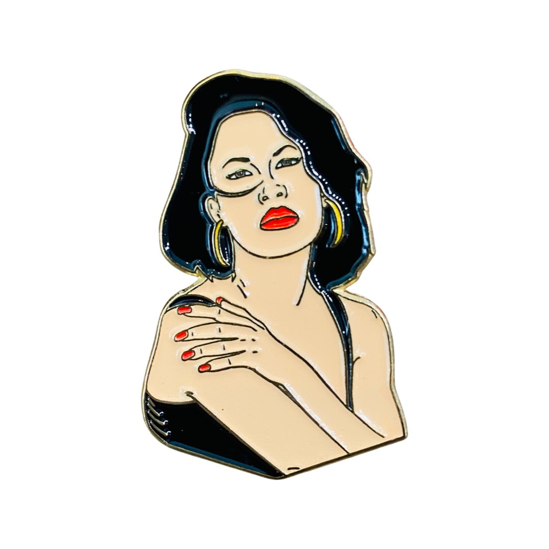 La Reina (Selena Quintanilla) Miami Beach enamel pin. Selena wears red lipstick and nails with gold hoops.