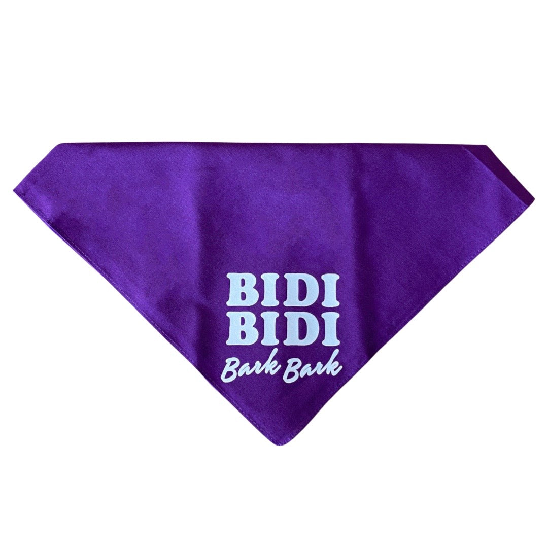 Purple dog bandana reads, "bidi bidi bark bark."