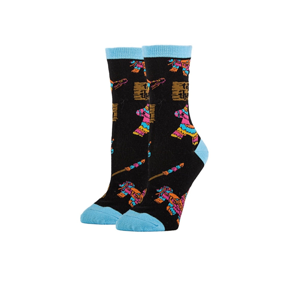 Women's black sock with colorful pinatas, sticks and "tap that" sign.