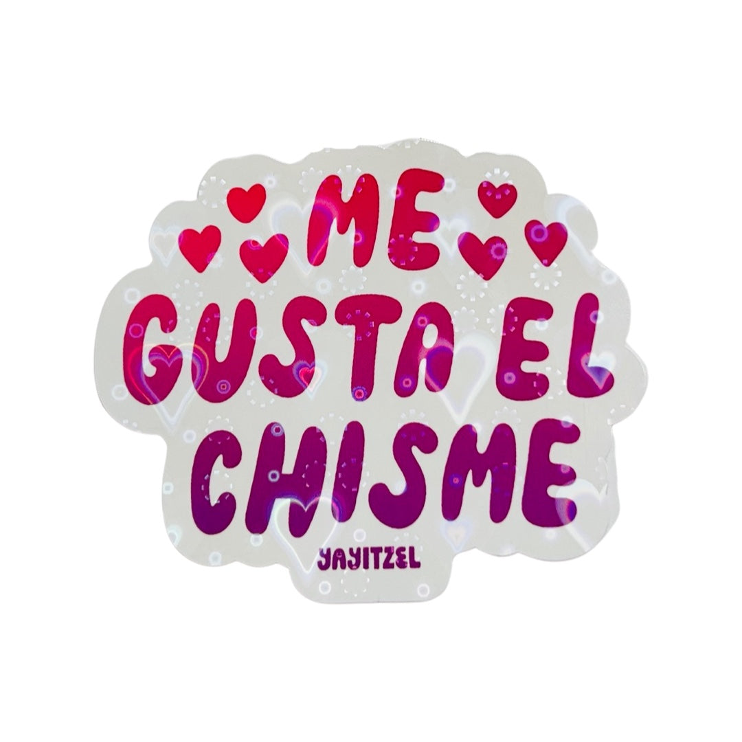 White sticker with the phrase Me Gusta El Chisme in purple lettering. Translation: I like gossip