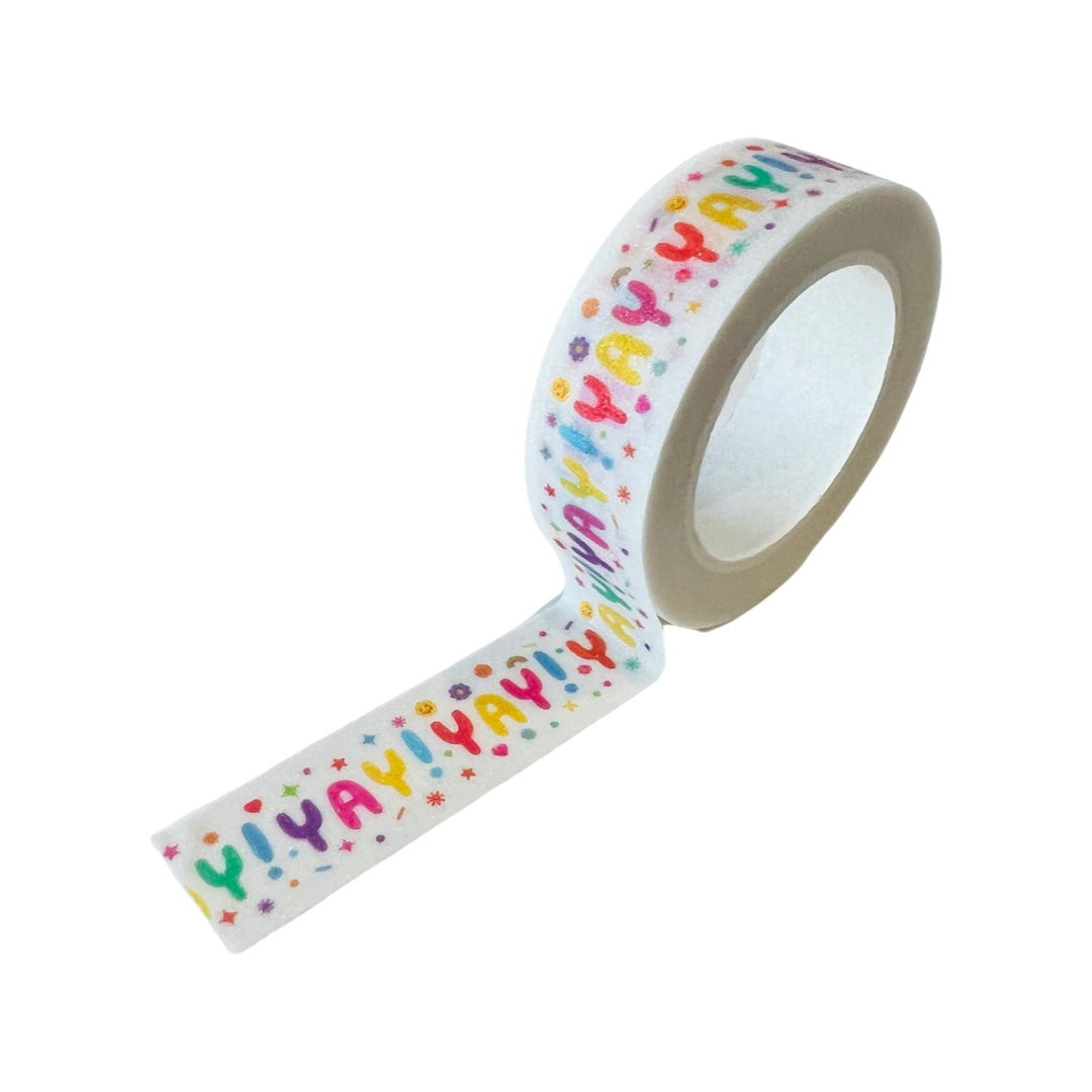 Single roll of washi tape that features the word Yay in various bright colors and has a little bitnof glitter