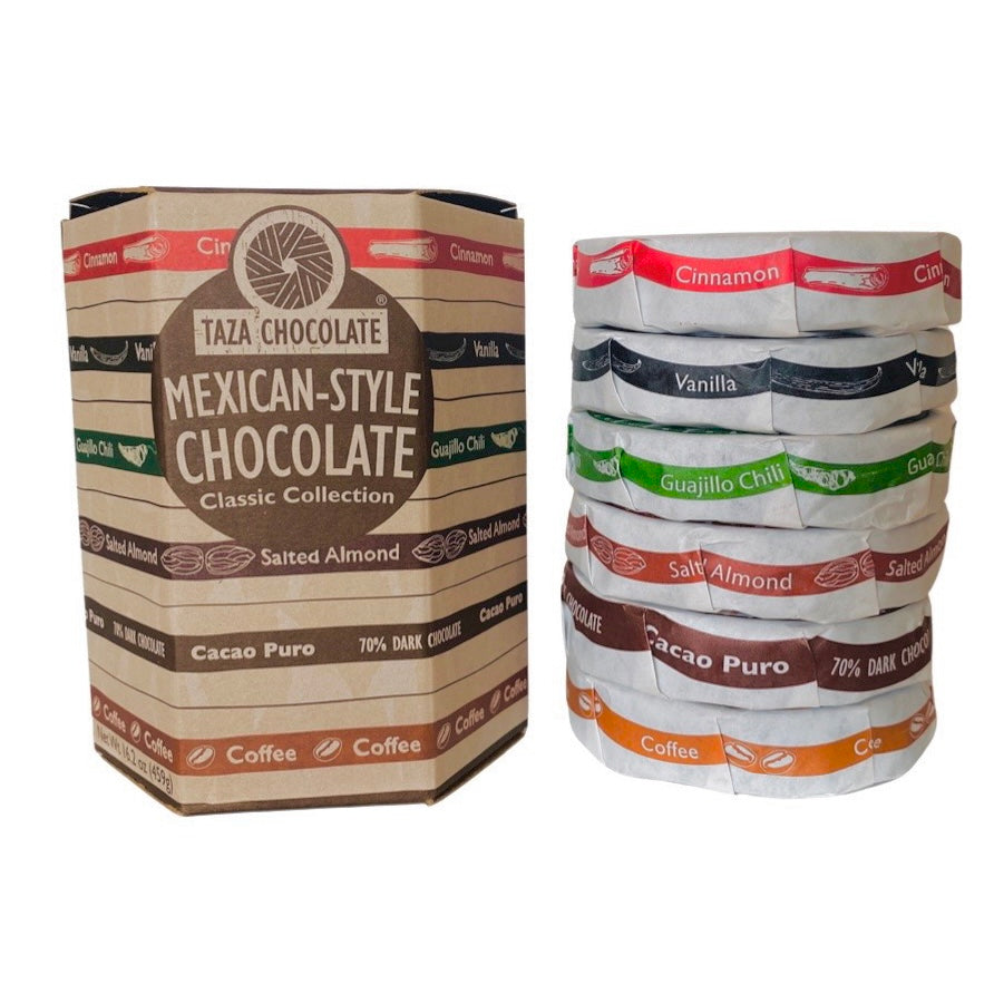 Front view of Taza Chocolate - Classic Collection pack, feature flavors: cinnamon, vanilla, guajillo chili, salted almond, cacao puro, and coffee in branded packaging. 