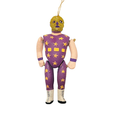 Paper mache style luchador ornament with dark purple & gold glitter mask & purple leotard with gold star pattern