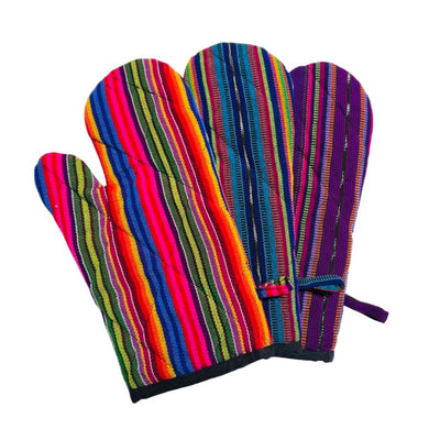 Colorful cotton fiesta oven mitts in pink, blue, and purple. Design features multicolored stripes. 