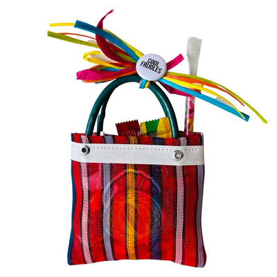 Mini candy bag. Candy comes in mercado bag with colorful ribbons, stickers, and pin. 