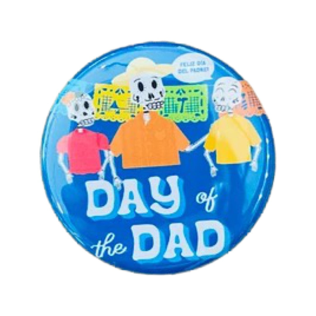 Round blue pin with three skeletons and the phrase Day of the Dad in white lettering.