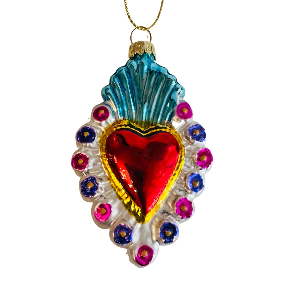 Hand-painted glass milagro heart ornament (style 1). Red heart is surrounded with a pink and purple floral border.