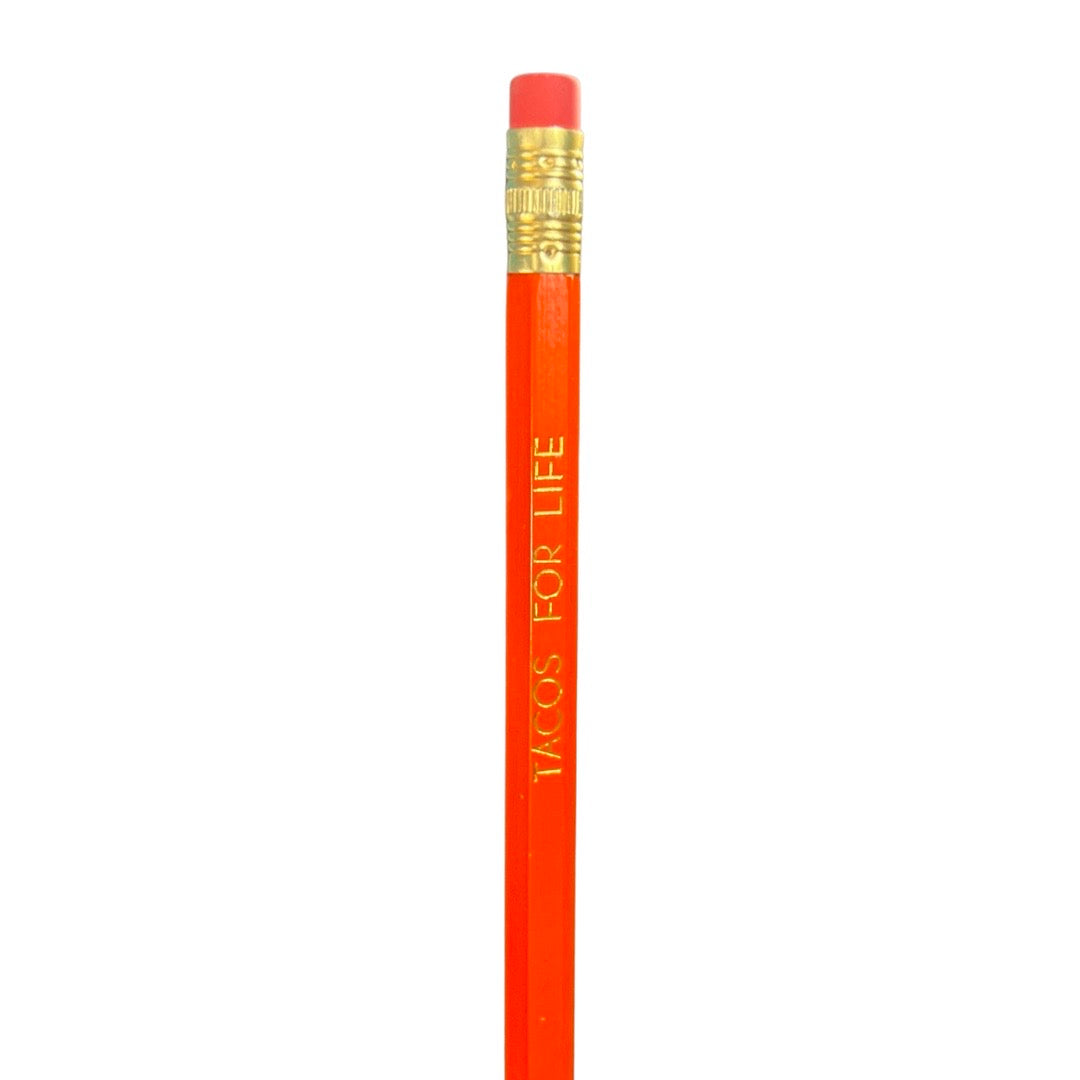 Orange pencil with the phrase Tacos For LIfe in gold lettering
