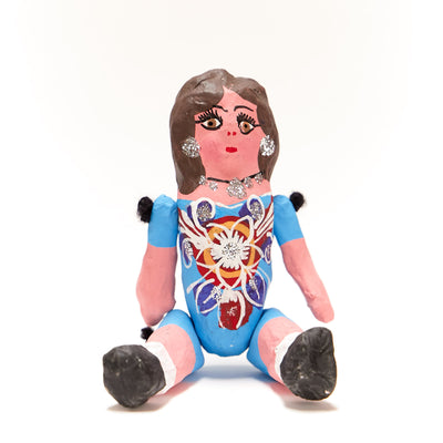 Paper Mache Muñeca (Doll) with movable arms and legs. Doll is wearing a blue dress.