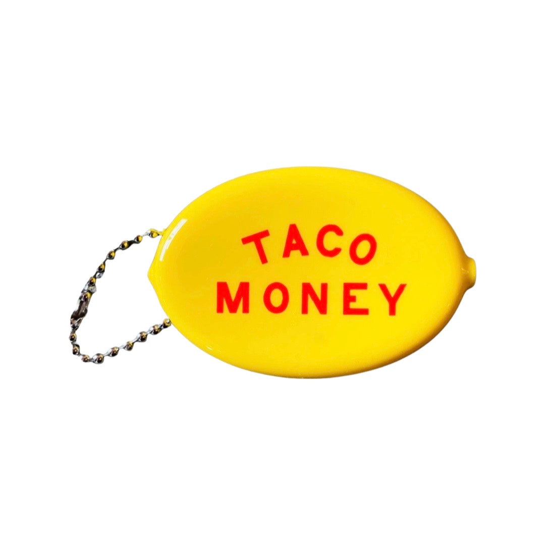 Yellow rubber coin purse with red lettering that reads "taco money".