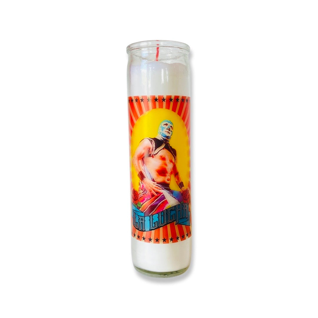 Tall glass candle featuring a luchador. 