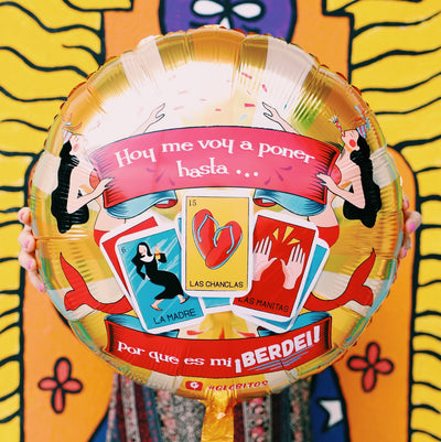 Loteria themed Spanish mylar "berdei" birthday balloon in front of Artelexia, "You Are Radiant" mural.