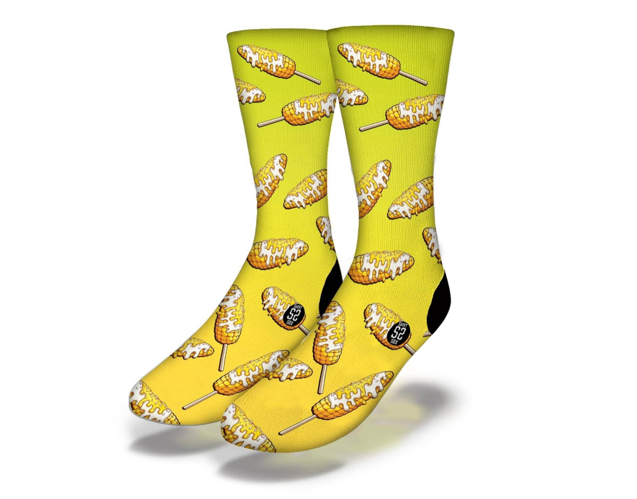 Men's mid calf yellow elote socks with black accent color.
