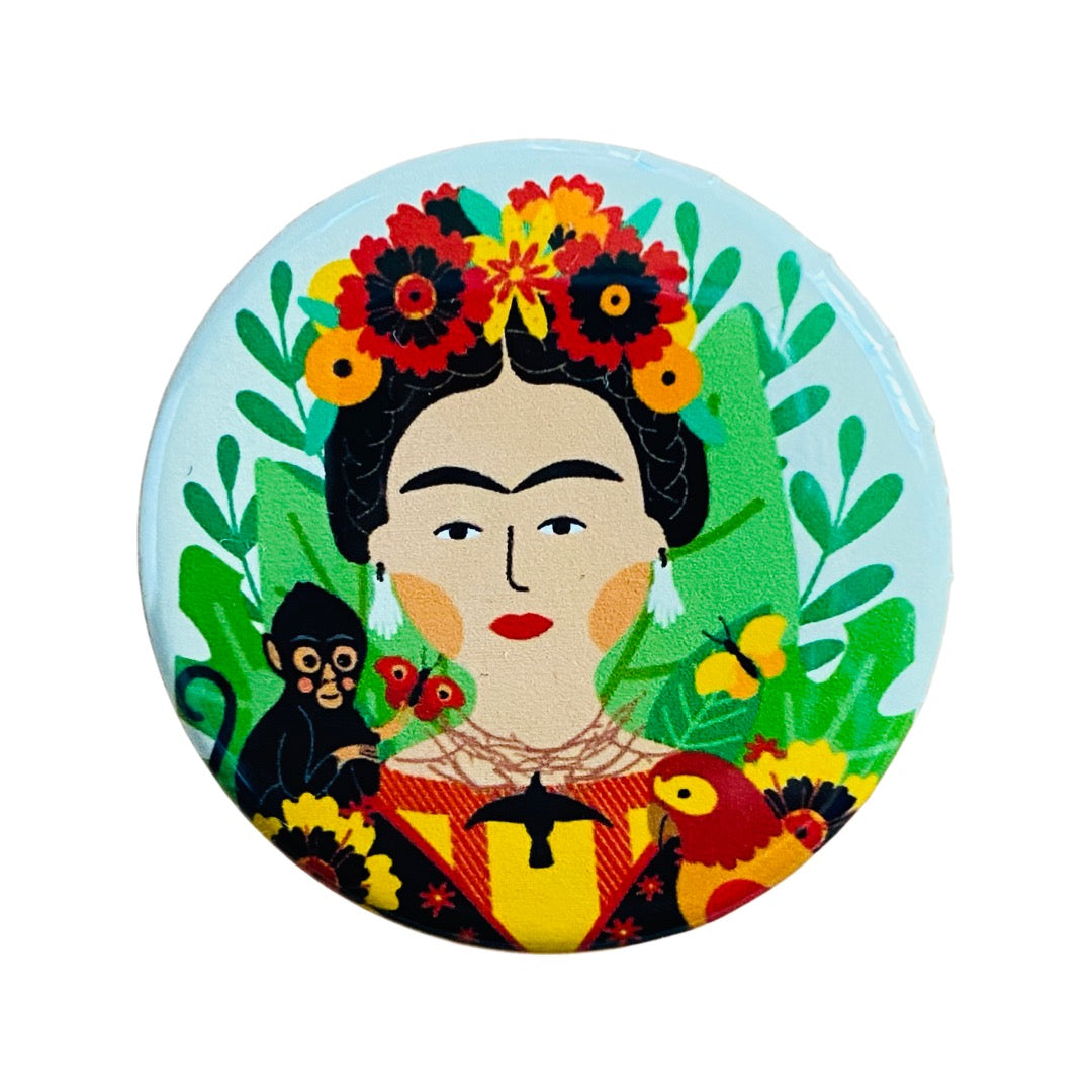 Round pin button with an image of frida and a moneky and parrot.