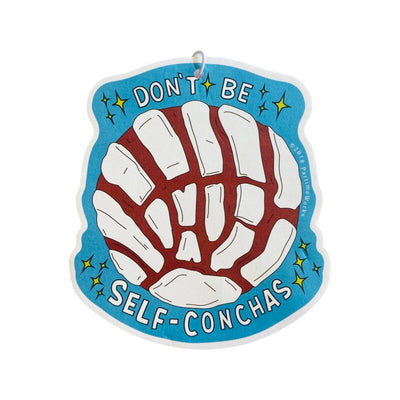 Blue air freshener with a white concha and the phrase Don't Be Self-Conchas.