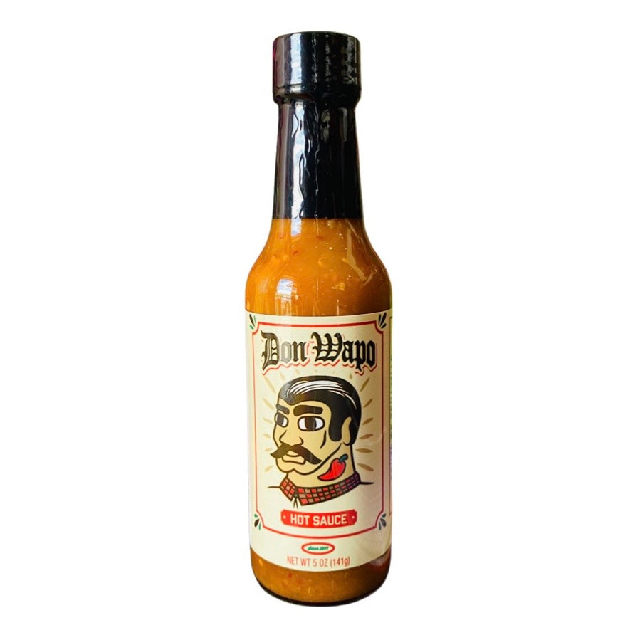 Don Wapo Hot Sauce- Fruta de Tomatillo packaged in a clear glass branded bottle.