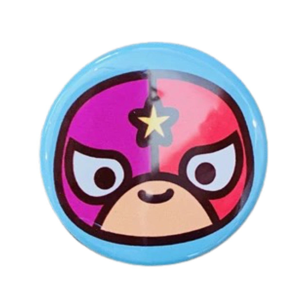 Light blue round pin button with a luchador  