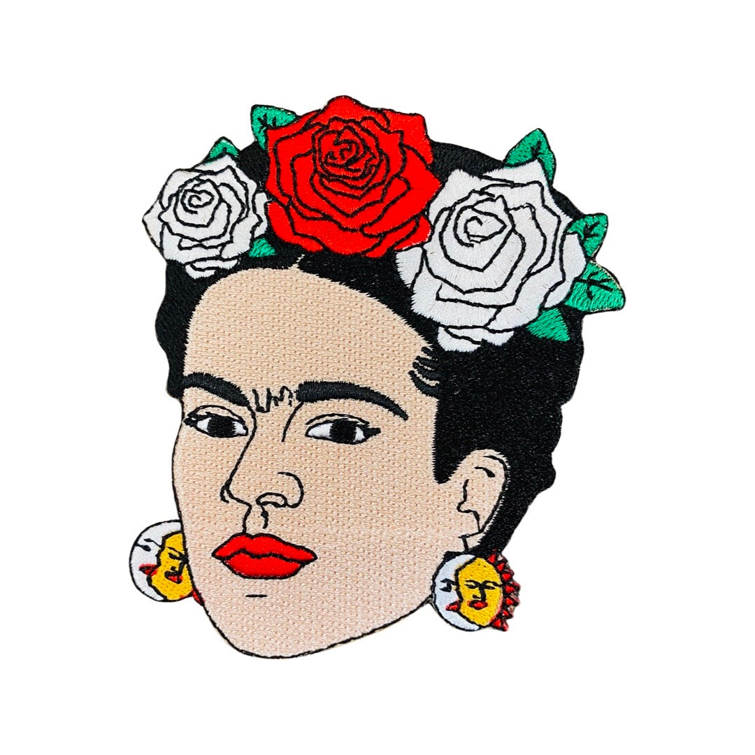 Frida Kahlo with sol y luna earrings iron on patch. Frida wears a red and white rose flower crown.