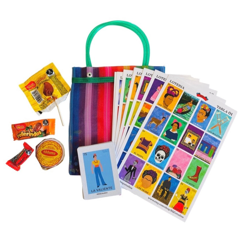 Frida Loteria Pack. Pack includes: one Frida Loteria game pack (8 player pack), one Frida La Calavera sticker, an assortment of Mexican candy, beans & mini chiclets. Everything comes in a colorful mercado bag.