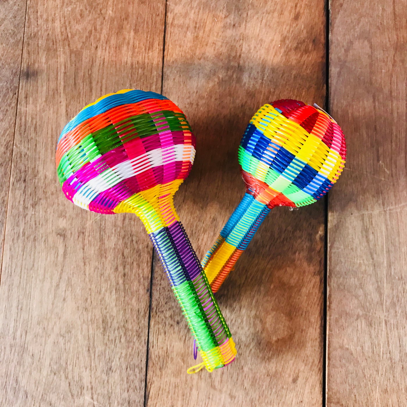 Mexican baby rattle woven with colorful plastic. 