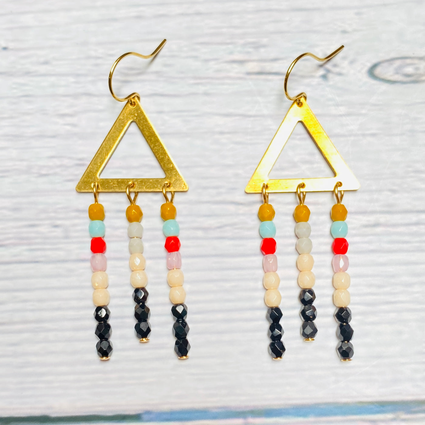 Gold plated brass triangle multicolored bead chandelier earrings.