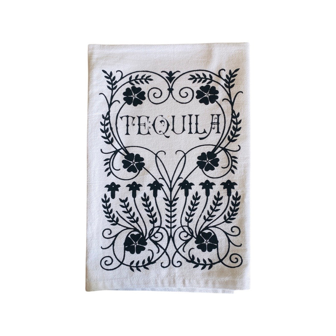 Black & white Tequila Kitchen Towel. Design features "Tequila" phrase, surrounded by floral vine design. 