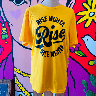 Yellow, "Rise Mijita" phrase t-shirt pictured on mannequin. 
