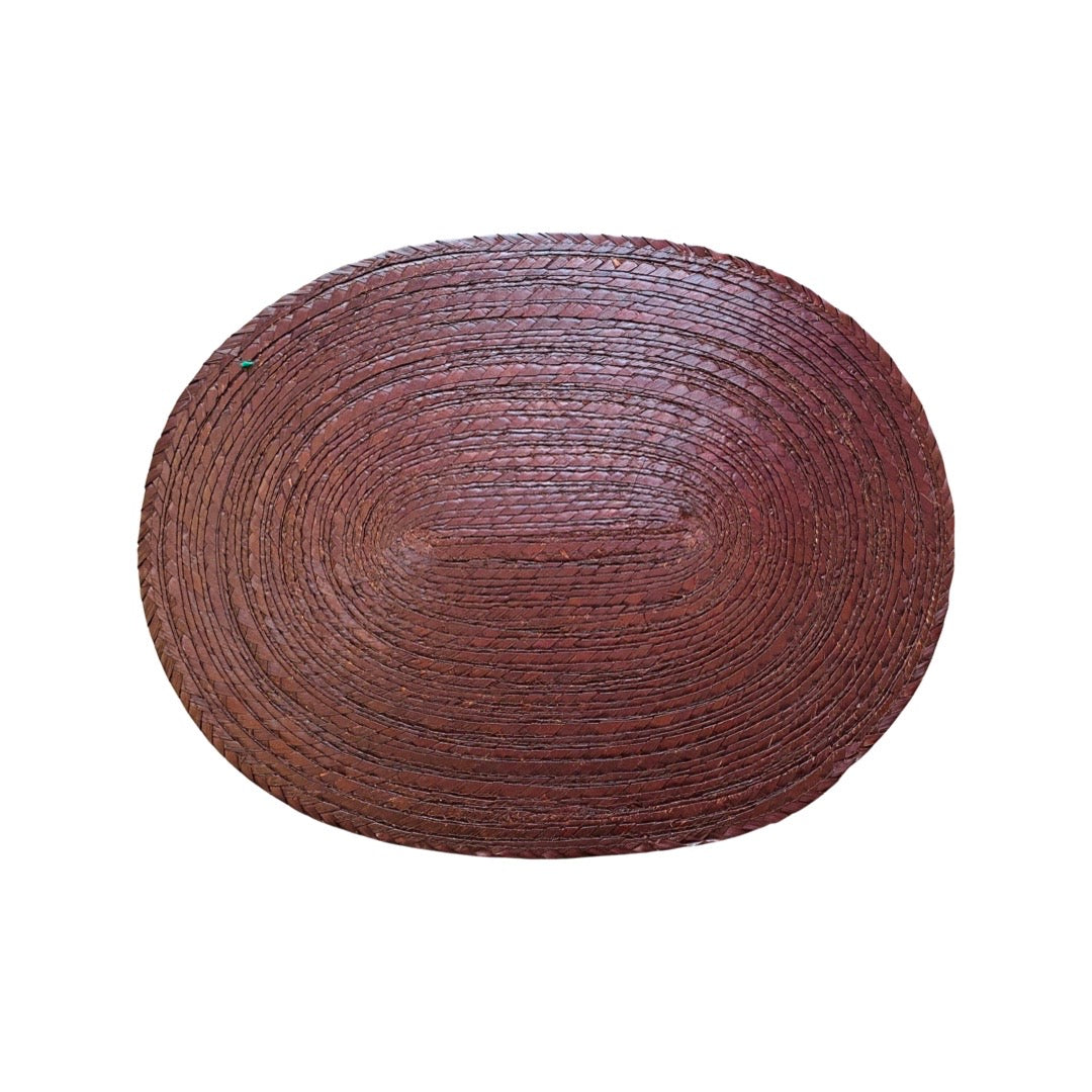 Mexican palma woven placemat (oval) in dark brown.