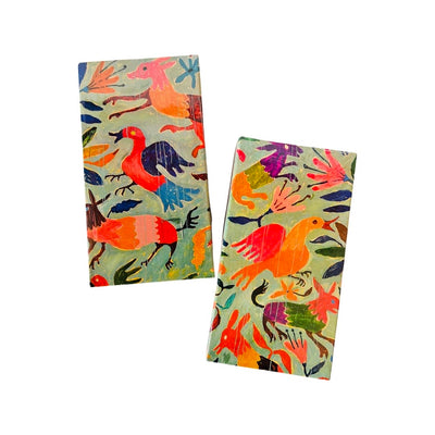 Matchboxes with images of colorful birds on the front.