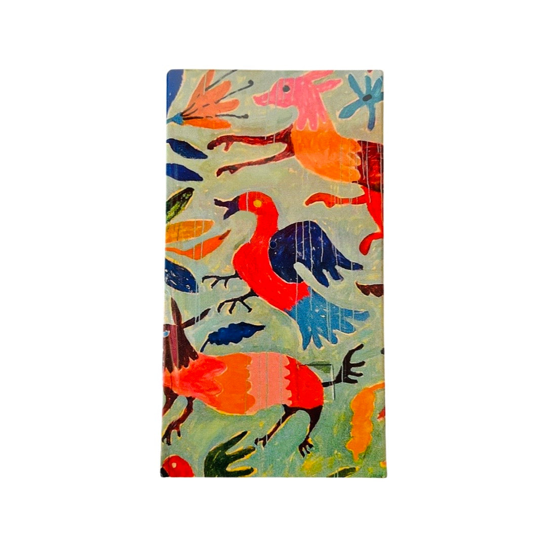 Matchbox with colorful birds on it.