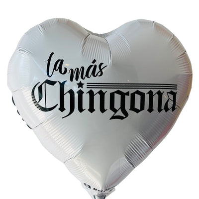 Heart shaped balloon in white that reads, "La Mas Chingona." Font is black. 