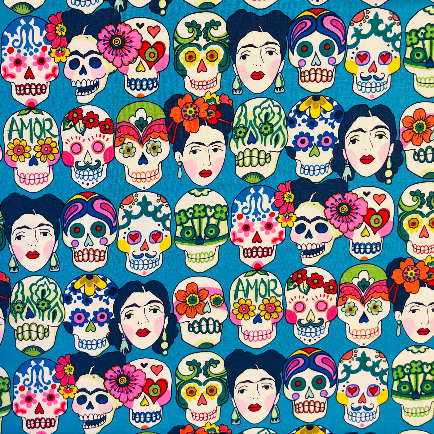Teal fabric with La Catrina skulls and Frida Kahlo's head