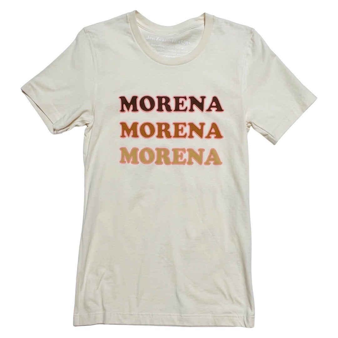 Light tan, "Morena" t-shirt featuring three different shades of brown with pink outline on phrase.